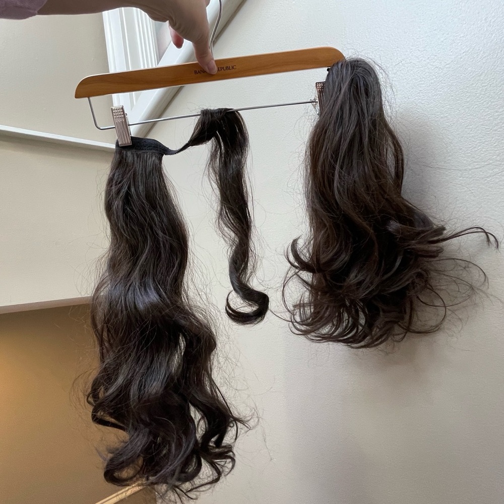 Two brown hair extension ponytails
